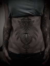 Check out the best tribal tattoo ideas for men here. Guy Le Tatooer Stomach Tattoos Lower Stomach Tattoos Tattoos
