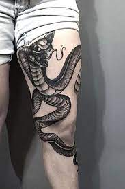 25 Unique Snake Tattoos For Men In 2021 Snake Tattoo Design Tattoos Eye Tattoo
