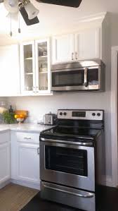 Small Kitchen White Cabinet Stainless Appliance Fresh Small Kitchen White Cabinets Carrara Marble Count In 2020 White Modern Kitchen Small White Kitchens Small Kitchen