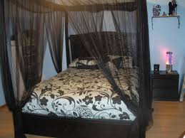 You can follow these steps to get easy steps and also inexpensive budget. Bedroom Romantic Canopy Beds Decoration Captured Nature With Black Curtain And Headboard And Flower Accent Canopy Bed Diy Canopy Bed Frame Canopy Bed Curtains
