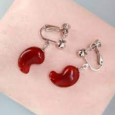 Magatama earrings - Etsy Österreich