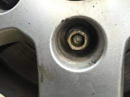 Use a metal hammer to knock the broken lug bolt out the back of the wheel. Broken Lug Nut Not Sure What Best Way To Remove This Mechanicadvice