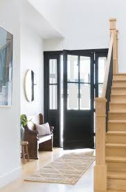 White interior french doors with glass. Welcoming Farmhouse Entry With Black Door And Sidelights Wood Staircase Bench Stairs Round Black Interior Doors Entry Door With Sidelights Modern Front Door