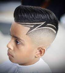 There's no reason not to get creative with kids hair. White Boy Haircuts With Designs