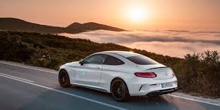 The New Mercedes C Class Coupe Is A Ridiculously Powerful German Muscle Car Mercedes Benz Cars Mercedes C Class Coupe Mercedes Coupe