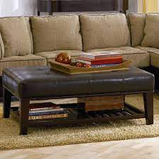 4d concepts brings us this combination ottoman and coffee table, with removable center wood tray revealing a finished wood surface interior. Coaster Ottomans 500872 Contemporary Faux Leather Tufted Ottoman With Storage Shelf Northeast Factory Direct Ottomans