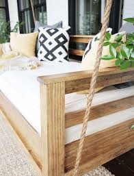 If you want the look of a swing bed without the actual swing and without worrying about the rope pulling free or breaking, then this idea is for you! How To Build A Porch Swing Bed Plank And Pillow