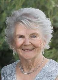 Celebrating 90th birthday of former teacher with cake and refreshments