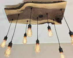 Check spelling or type a new query. Custom Olive Wood Chandelier Rustikaler Kronleuchter Holzplatte Beleuchtungsideen