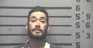 Police: Handgun and nunchucks found in felon's car in Madisonville