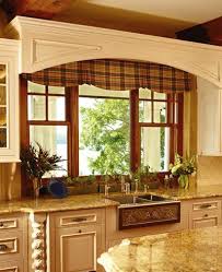 Two Operating Ultra Series Sterling Double Hungs Flank A Studio Window For A Beautiful And Functional V Kitchen Window Kitchen Cornice Rustic Windows And Doors