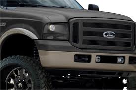 The springs fit between a pair of brackets on the inner surface of the housing. Projector Headlight Upgrades For Trucks The Retrofit Source