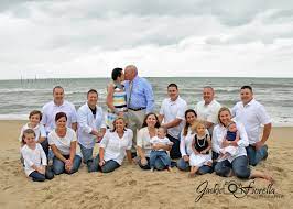 Large Family Pose Beach Session Outdoor Photography Extended Family Kissing Parents Large Family Poses Family Posing Family Beach Pictures