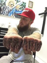 Submit your ideas and our team of artists will work. 808 Mafia Tattoo Done By Kintoz Black Rosary Art Collective Black And Grey Tattoos Celebrity Tattoos Tattoo Artists