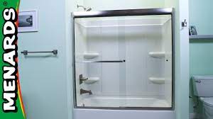 Assembly clamps onto the top of the shower door glass with a vinyl glazing gasket. Tub And Shower Door Installation Menards Youtube