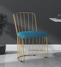 The original photo in powder blue is no longer available. Buy Gavin Dining Chair In Brass Finish Bohemiana By Pepperfry Online Low Back Lounge Chairs Chairs Furniture Pepperfry Product