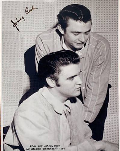 This is a rare photo of Johnny Cash and Elvis Presley together (autographed  by Johnny) at SUN Studios in Memphis. Elvis had already signed with RCA but  stopped by to see his
