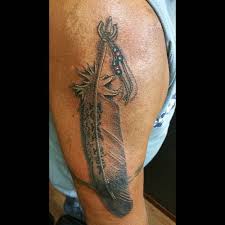 The feather tattoo comes in various designs and styles. Tribal Eagle Feather Tattoo Novocom Top