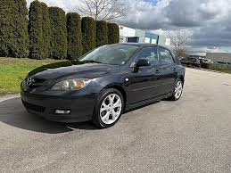 Image result for Sparkling Black 2007 Mazda3