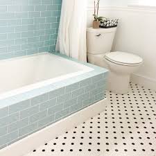 The shower surround in this bathroom is clad in subway tiles and matching white grout, creating an uninterrupted plane of white. Bathroom Shower Tile Pictures Cnk Tile