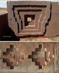 Locked together in silence, these stones lie at the ancient site of Puma  Punku in western Bolivia, part of the larger Tiwanaku complex near Lake  тιтicaca. Thought to have been constructed between
