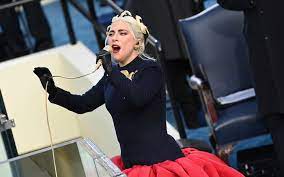 Artistic director daniel roseberry said lady gaga's outfit was made in paris just days before the inauguration of u.s. Lady Gaga Wows In Red Blue Schiaparelli Gown For Inauguration Day Footwear News
