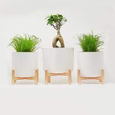 Bring The Outdoors Indoors With These Windowsill Copper Plant Stands Inspired By Individuality This Beautiful W Modern Plant Stand Plant Stand Diy Plant Stand