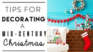 For retro charm, look to chairs with curvy backs and lamps with geometric legs. Christmas Decorating Mid Century Christmas Design Style Youtube