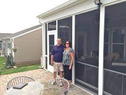 Sandstone four season room with vinyl frame and glass knee wall enclosing an existing covered patio. How Long Does It Take To Build A Sunroom Screen Porch Conversions Patio Enclosures 3 Season Sunrooms