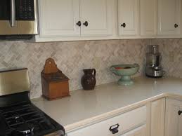 Beautify your kitchen backsplash with one of these stylish tile ideas. Cream Herringbone Stone Mosaic Tile Mosaic Backsplash Kitchen Kitchen Tiles Backsplash Mosaic Tile Backsplash Kitchen