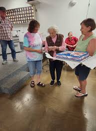 VFW auxiliary honors member with 65 year pin