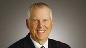 Auto dealer Tom Wood dies