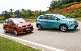 Join our list of satisfied customers! Compact Car Shootout 2018 Perodua Myvi 1 3l Vs Kia Picanto 1 2l Carsifu