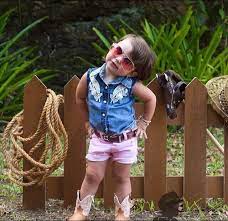 Little Girl In Cowgirl Outfit And Wearing Sunglasses Toddler Cowgirl Outfit Little Girl Outfits Kids Fashion