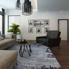 Abstract Blue Rug In This Stylishly Modern Living Room The Rug Establishment Rugs In Living Room Blue Rugs Living Room Living Room Modern