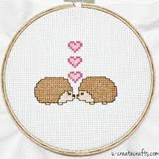 This pattern is in pdf format and consists of an example photo, a floss list, and a color symbol chart. Hedgehog Cross Stitch Pattern Craftgawker