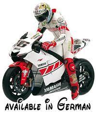 b000vvwfss minichamps 312050086 figurine sitting valentino rossi moto gp valencia massstab 1 12 modellart figurine minichamps valentino rossi valentino