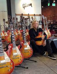 Joe Walsh With His 60 Tangerine Burst Surrounded By A Room Full Of His Custom Shop Reissues Guitar Les Paul Gibson Les Paul