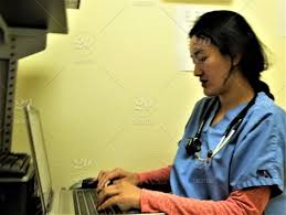I like the feature that checks the activity on your computer. Healthcare And Medicine Using A Computer A Woman Doctor Wearing Blue Scrubs Reviews The Medical Information Of The Patient Before Making A Diagnosis Empowered Independent Successful Woman Doctor Stock Photo 257f02f5 A6a0 4905 873a 507cd52c8656