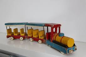 Pin By Jennifer L Frazer Write And C On Spark Toys Such Vintage Y Designer Hand Crafted With Images Wooden Train Wooden Toy Train Wooden Puzzles