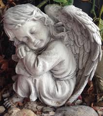 The spiritual being, an angel is envisioned as sacred intermediary between mortals and the divine. Sleeping Girl Angel Concrete Statue 0327 Pots N Pots
