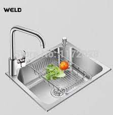 Wickes kitchen sinks fit any kitchen style and come in left, right and reversible layouts. Kitchen Sink Accessories Basket Free Shipping Pull Retractable Drain Basket R Kitchen Sink Accessories Small Country Kitchens Country Kitchen Designs