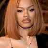 Medium to light brown hair is still not an outrageous hair color, but it does offer a bit more boost to dark skin tones than dark brown hair. 3