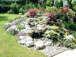 Building A Rock Garden How To Build A Rock Garden On A Slope Building Rock Garden Building A Rockery Dizajn Sada Kamnej Sad Na Sklone Ozelenenie Zadnego Dvora