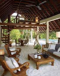 A beach deck with a pool, some contemporary furniture, a hammock and a gorgeous sea view. 59 Cool Sea And Beach Inspired Patios Digsdigs