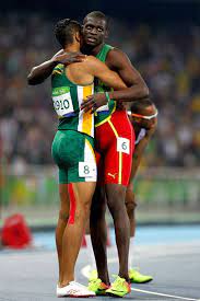 Challenging gender policies in sport | foul play 2021, июнь. Wayde Van Niekerk Of South Africa Celebrates With Kirani James Of Grenada Second Track And Field Athlete Men In Tight Pants Track And Field