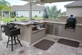 outdoor kitchen with pergola, knee wall