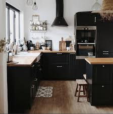 Kitchen islands for less, at your doorstep faster than ever! Black Modern Kitchen With Butcher Block Countertops Scandinavian Openshelving Boho Kitchendesign Home Decor Kitchen Kitchen Design Home Kitchens