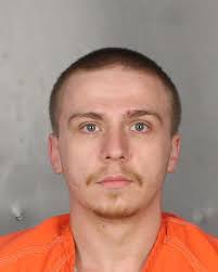 Two re-indicted in death of local rapper, one indicted