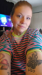 Who is a good tattoo artist for a mushroom tattoo?